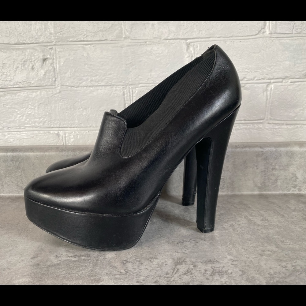 ALDO black leather boot heels